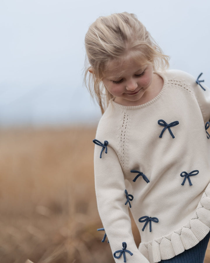Hanevild More Bows Genser – Ivory for barn - Brobrobrille