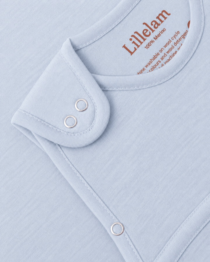 Lillelam Sovepose Luna i Merinoull - Himmelblå for barn - Brobrobrille