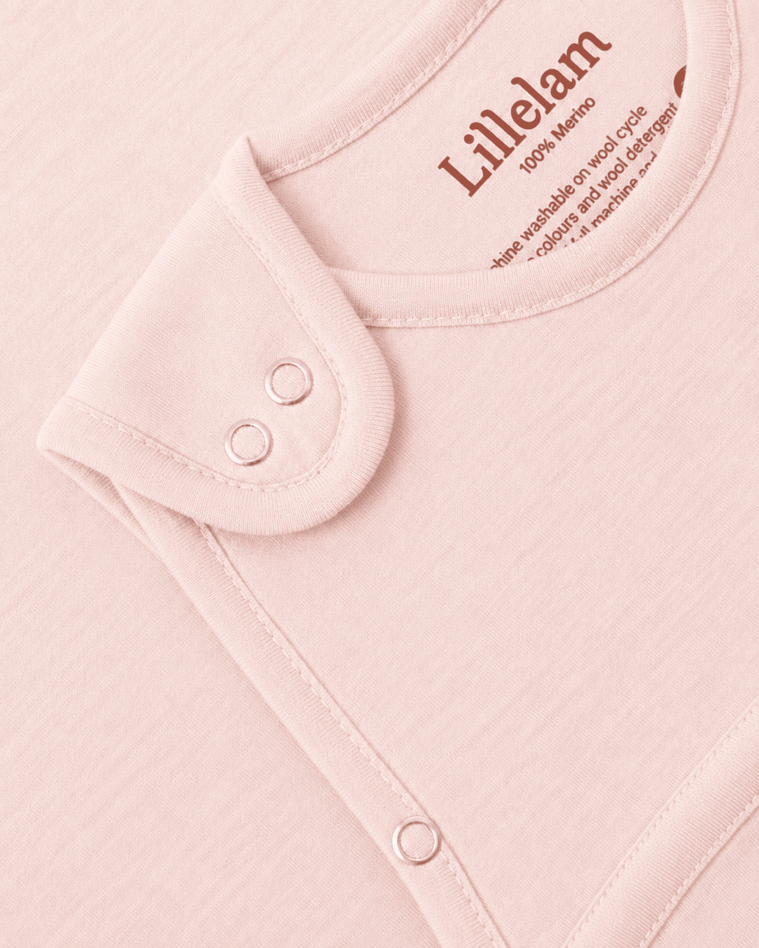 Lillelam Sovepose Luna i Merinoull - Himmelrosa for barn - Brobrobrille