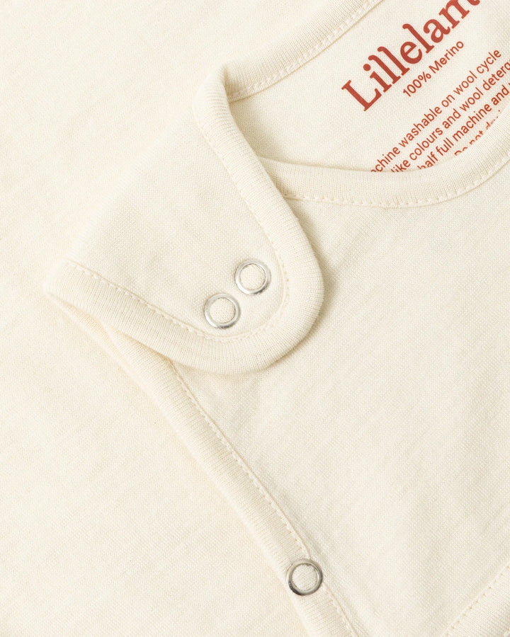 Lillelam Sovepose Luna i Merinoull - Hvit for barn - Brobrobrille